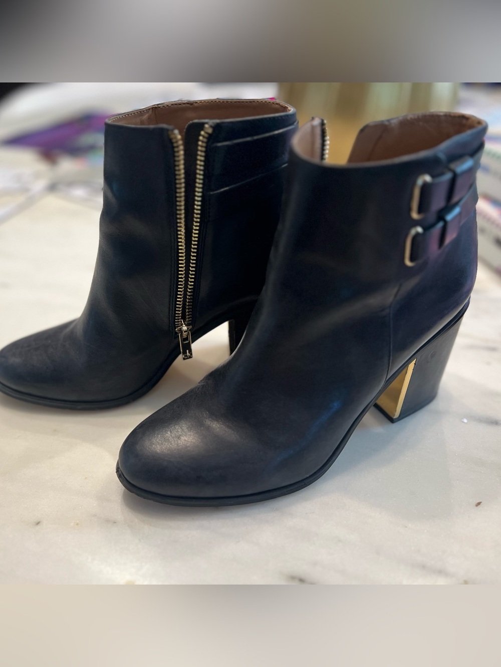 Calvin Klein Black Leather Ankle Boots with Gold Zipper & Heel Accent